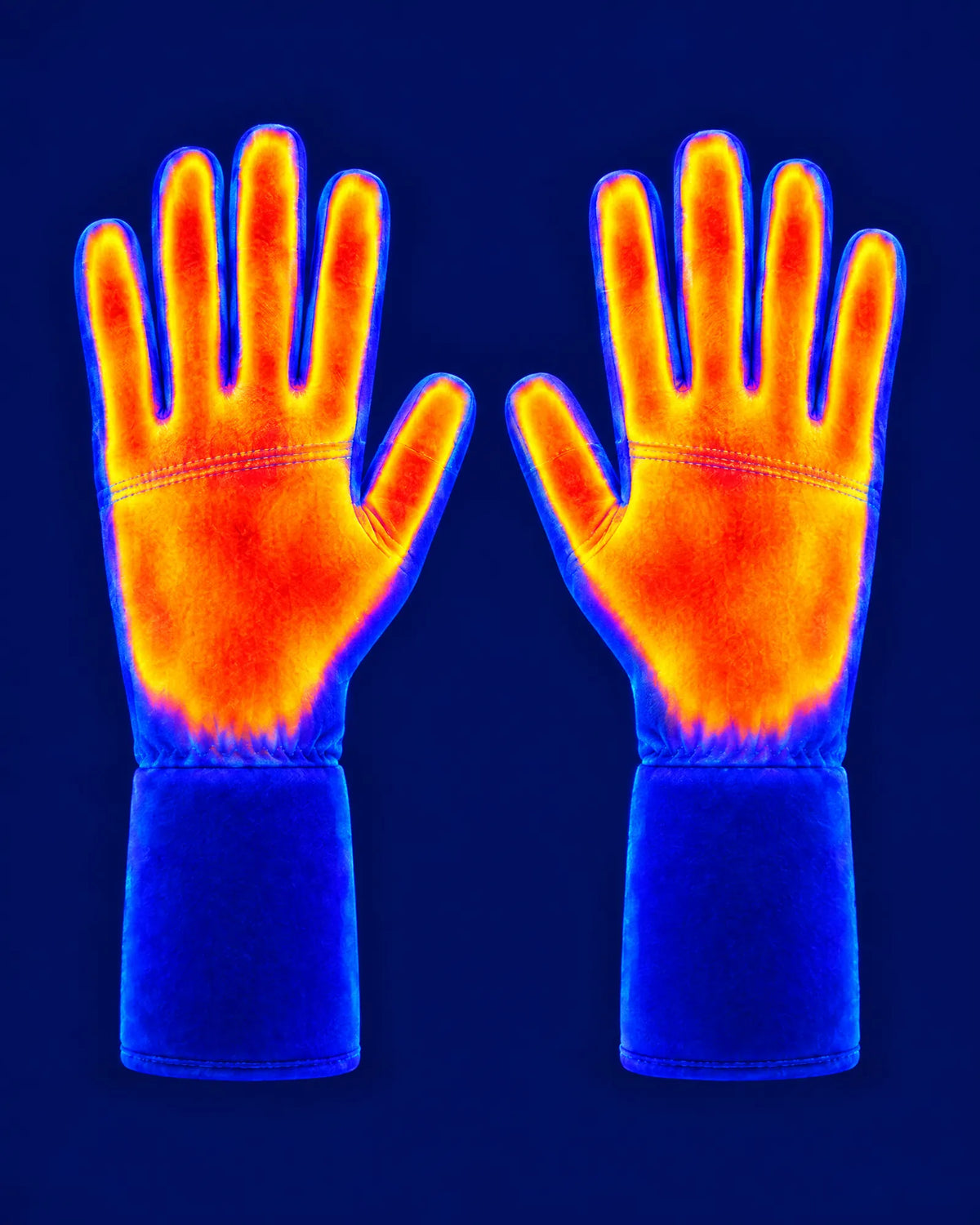 Thermal image of the Belay heated gloves showing heat across the hands and fingers