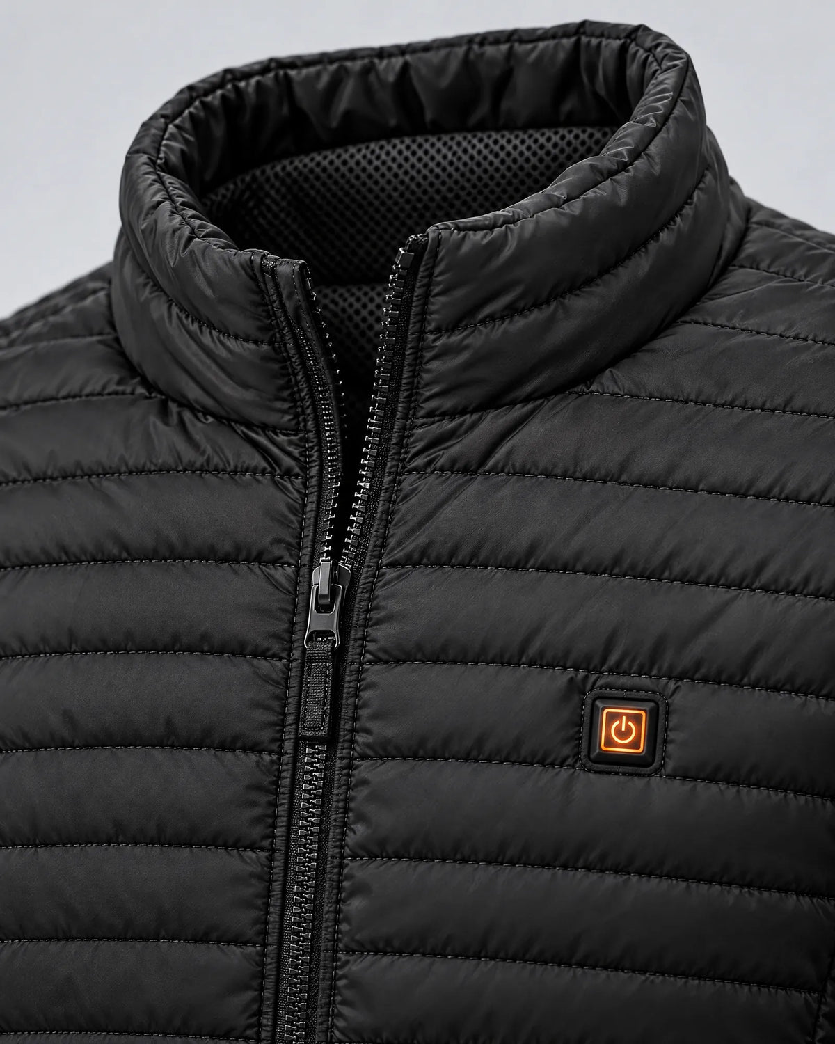 Close-up of the Basecamp jacket collar and glowing power button