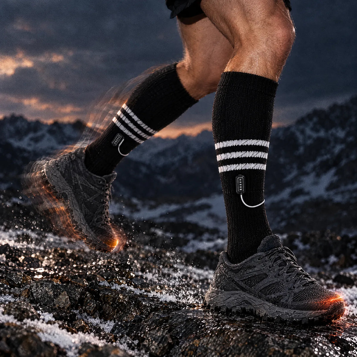 Runner on wet scree in Switchback heated socks with the battery on the outer calf